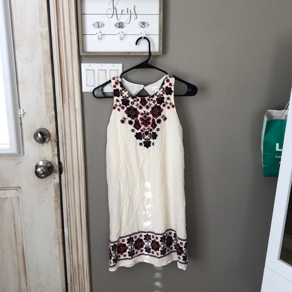 floral and cream dress.
